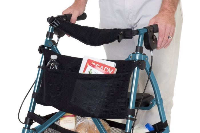 Two Pocket Organizer Pouch (4303) attached to EZ Fold-N-Go Walker, with a water bottle in one pocket and magazines in the other.