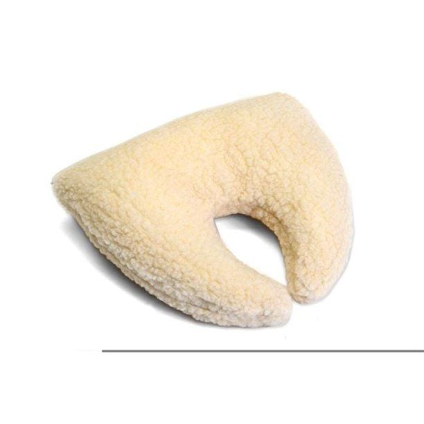 Faux sheepskin neck pillow shown individually.