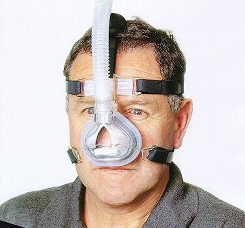 Man wears the Aclaim 2 Nasal CPAP Mask