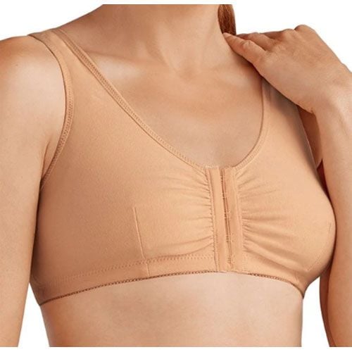 Woman wearing the beige bra.