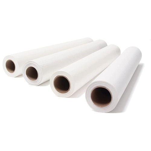 Four rolls of Avalon Exam Table Paper.
