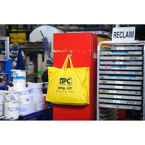 The yellow PVC bag includes handles that can be used to hang or carry the kit wherever it needs to go.