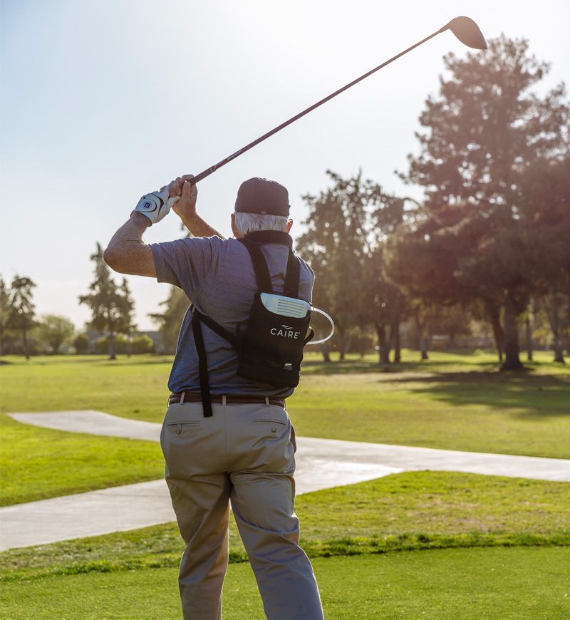 Man golfs while using CAIRE Freestyle Comfort POC