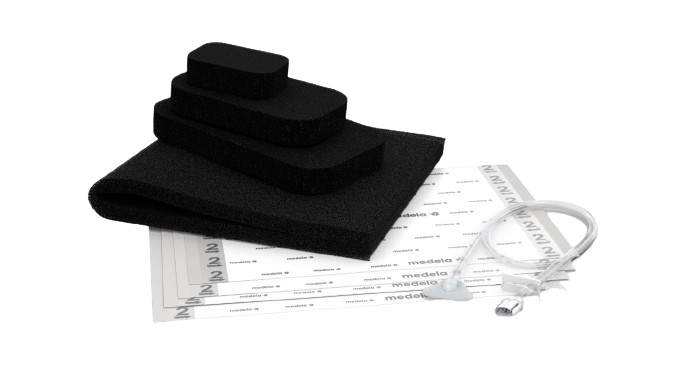 Foam dressing kit with tubing and transparent film