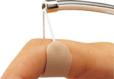 A close-up of the end tubes, thread, and sling.