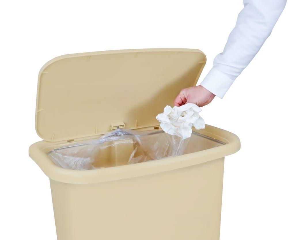 Man placing trash in beige Detecto Waste Mate
