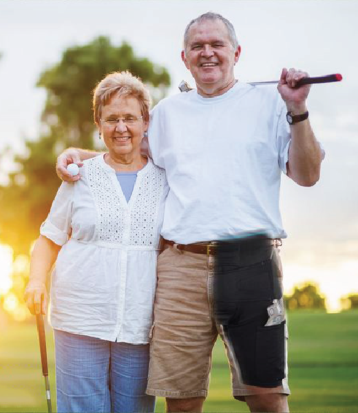 Man Golfing Wearing Shorts With CathWear