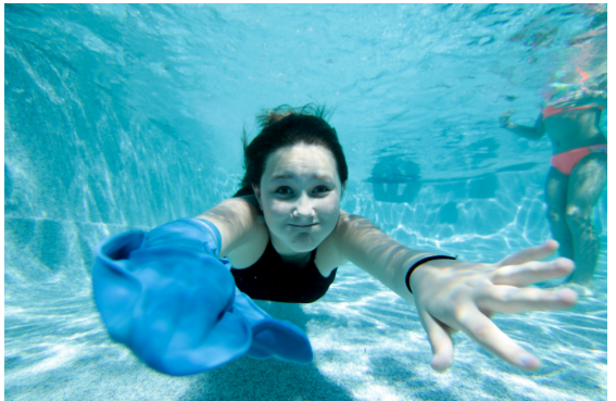 Girl Swimming with Cast Protector