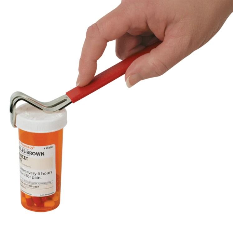 Person opening bottle with the Opener