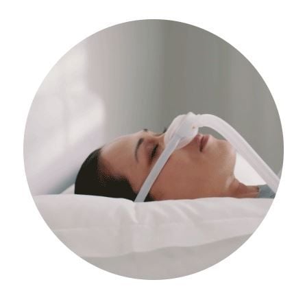 Sleeping Woman Wearing Fisher & Paykel CPAP Mask