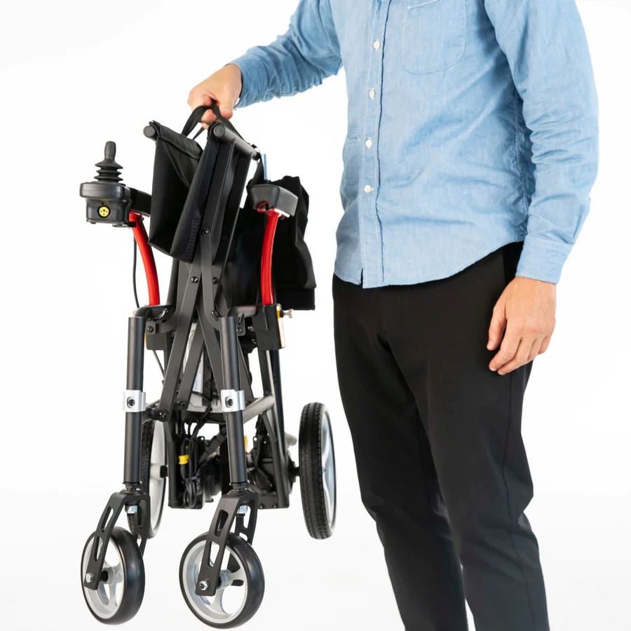 The ultra-light, folded Featherweight Power Chair is easily lifted
