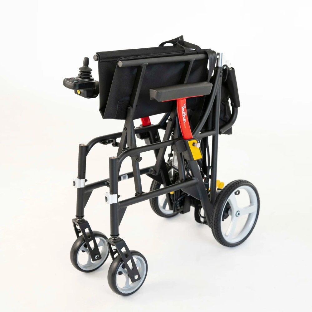 Feather folded power wheelchair with dimensions of 13 x 28 x 27 inches