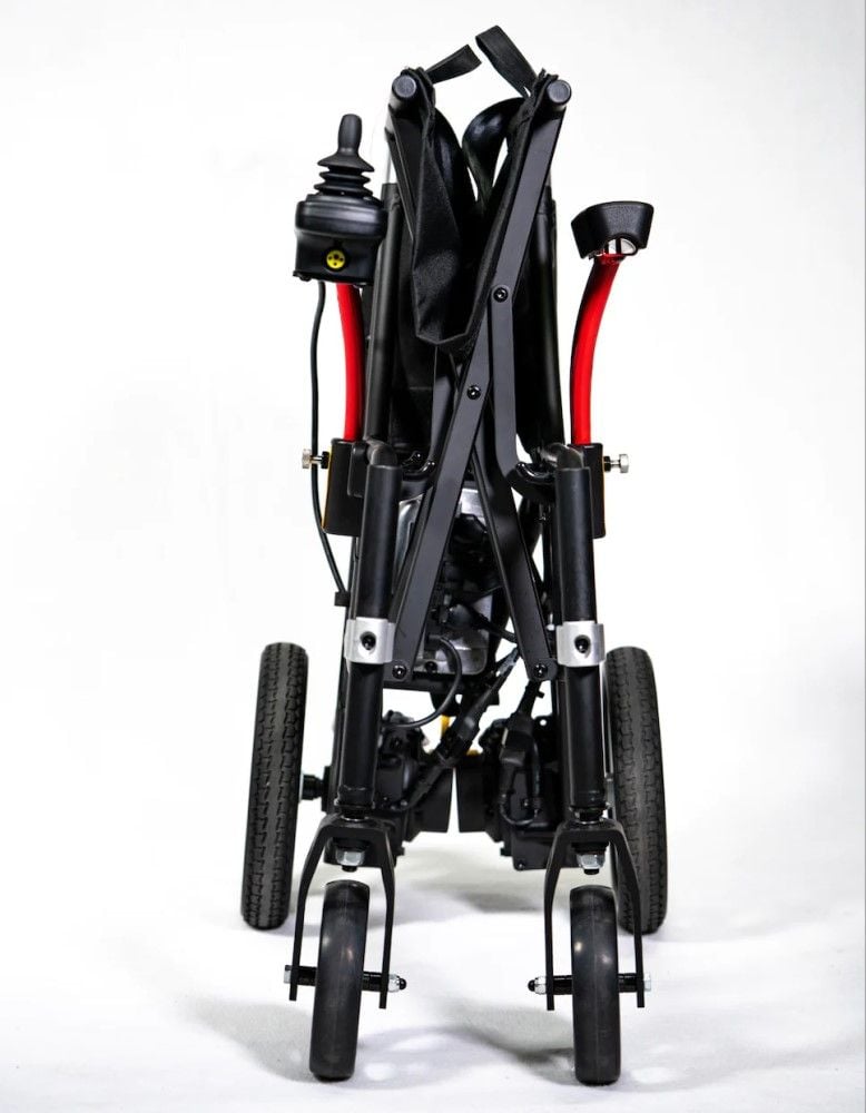 The Feather Power Chair folded into one compact piece