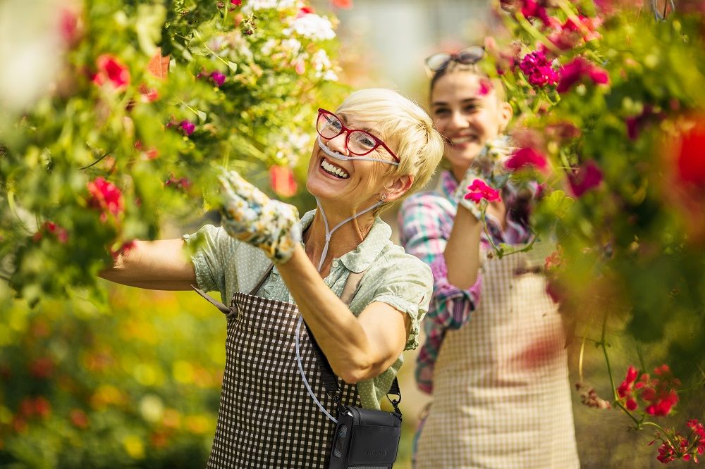 Women Gardening With Cannula and G5 Unit Inside Carry Bag