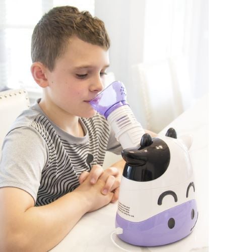 Child using the Margo Steam Inhaler