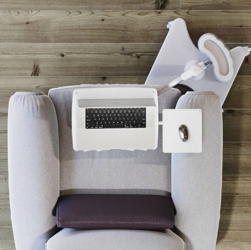 White Laptop Stand in Front of Beige Chair