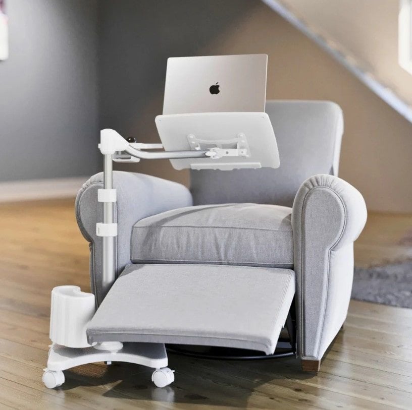 White Rolling Laptop Stand in Front of Reclined Chair