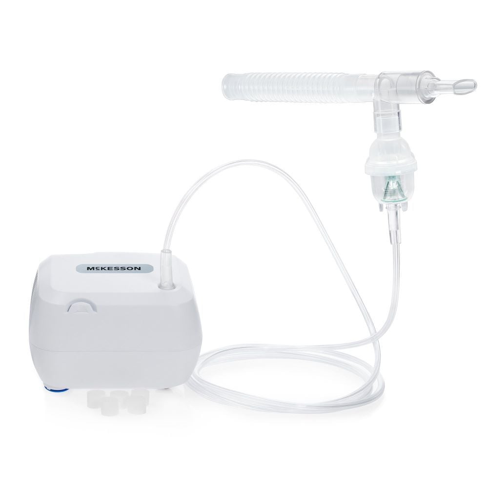Compressor nebulizer unit with accessories.