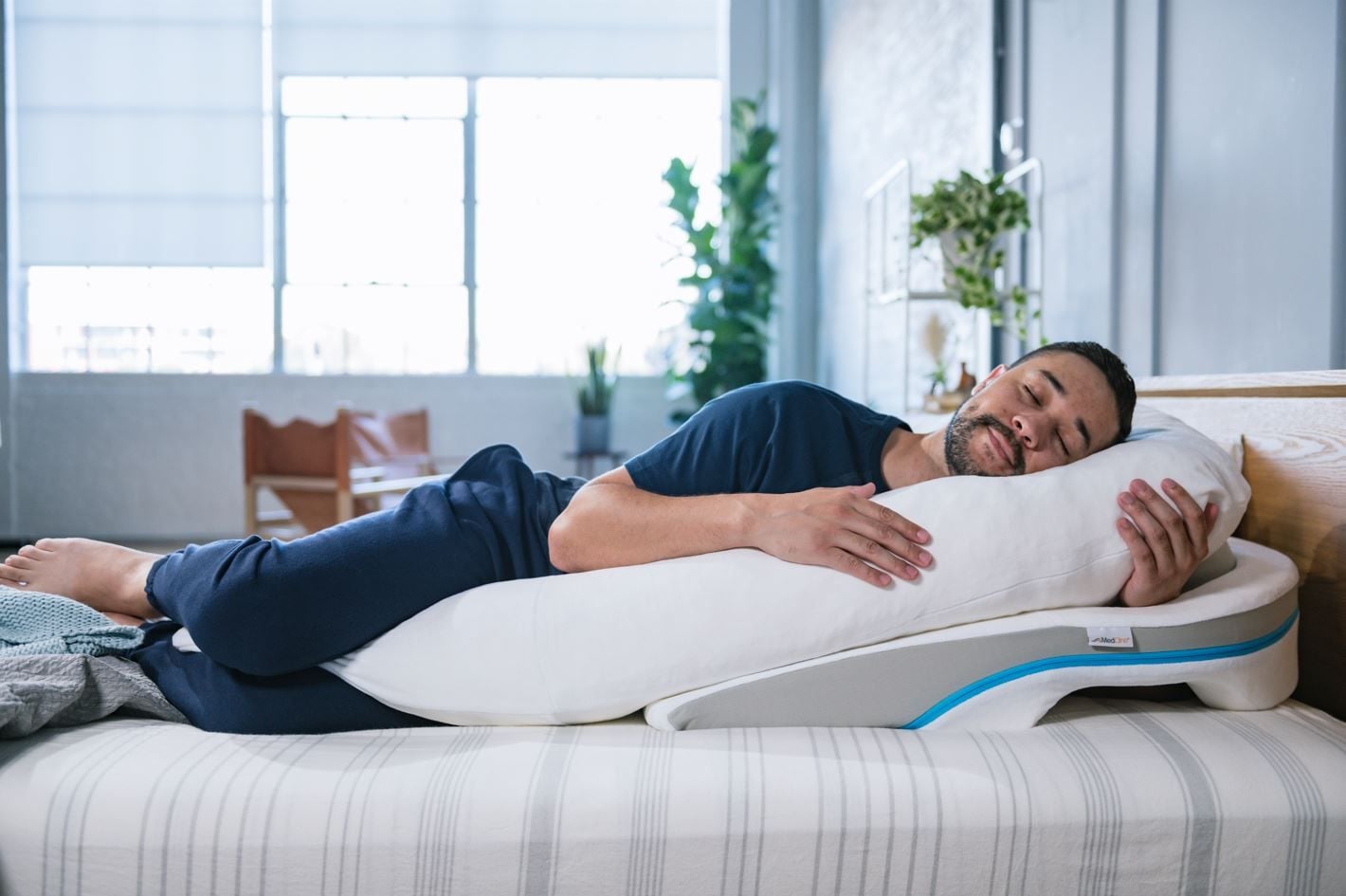 Man Sleeping on Wedge