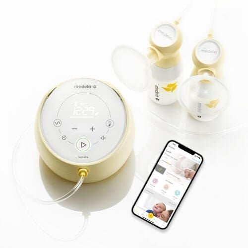 Breast pump, collection bottles, breast shields, and app displayed on a smartphone.