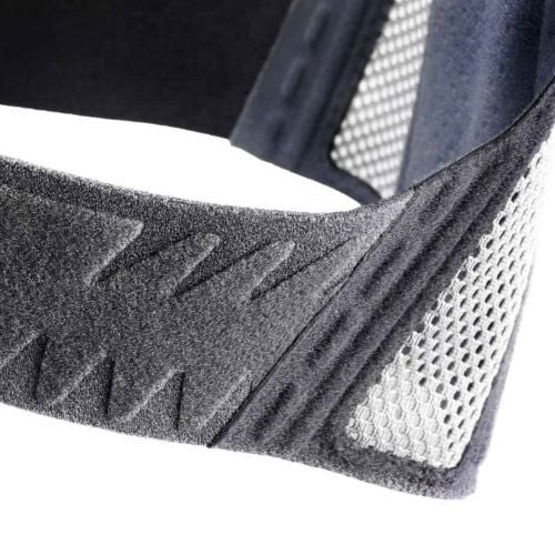A close-up image of the waist strap and breathable mesh on the Spinomed IV AP support brace.