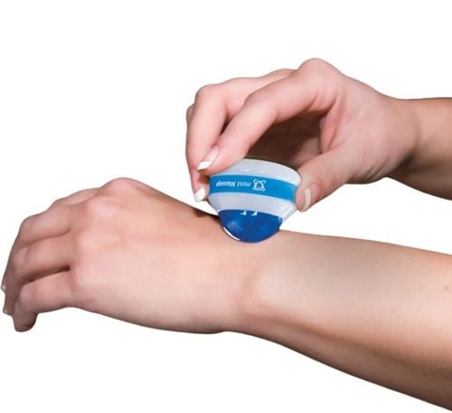 The Omni Mini Massager in use on the wrist.