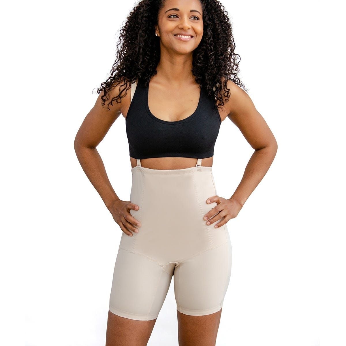 Woman wearing the Motif Postpartum Recovery Garment