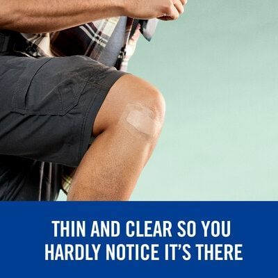 A knee with a Nexcare Max Hold bandage