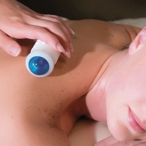 The Omni Multi-Massager in use on the back and shoulders.