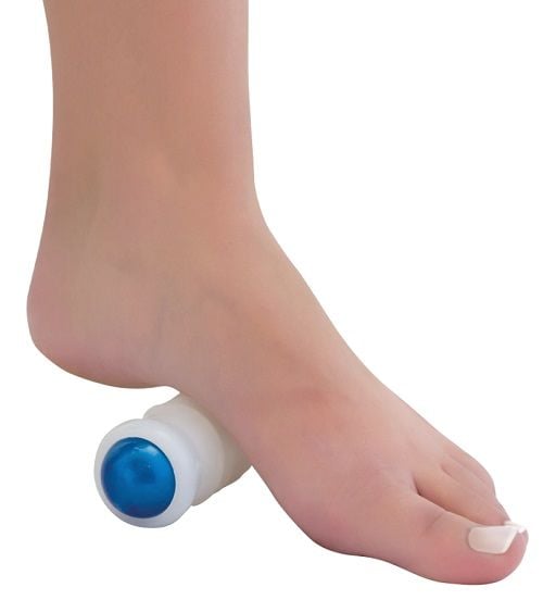 The Omni Multi-Massager in use on the sole of a foot.