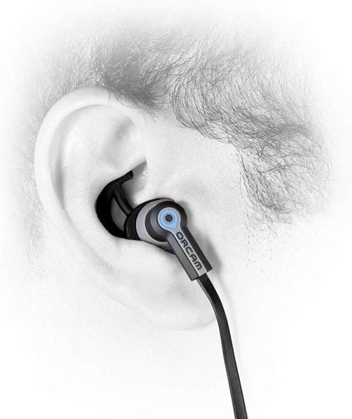 A close-up image of the OrCam Bluetooth headphones in someone's ear.