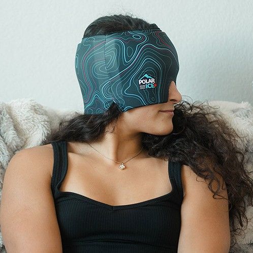 Woman wearing cap from side