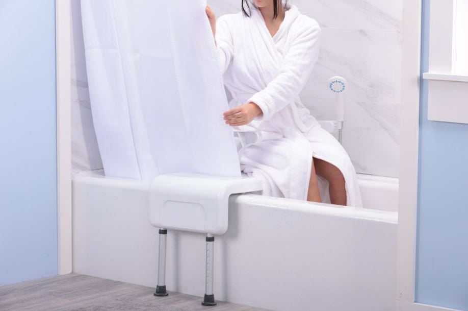 Woman Pulling Curtain Behind Transfer Accessory
