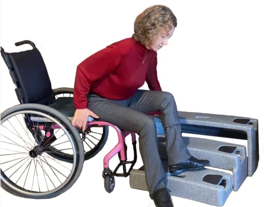 Woman Using ResQUp To Mount a Wheelchair