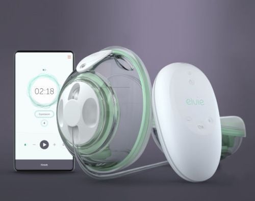 Breast pump components and app displayed on a smartphone