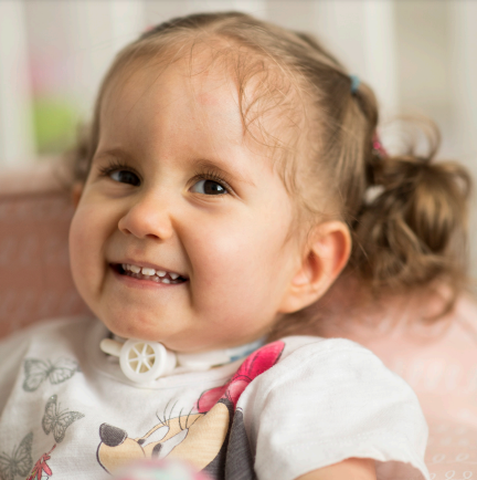 Girl with Pediatric Tracheostomy Tube