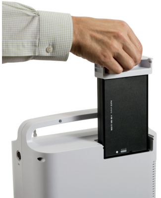 SimplyGo user inserts the battery replacement