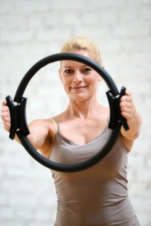 Woman using Circle on arms