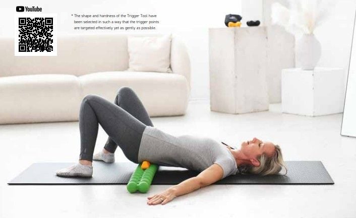 Woman lying on SPINEFITTER with extension