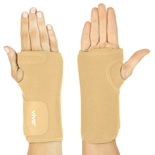 The Vive Carpal Tunnel Standard Wrist Brace in beige.