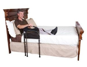Stander Mobility BedRail attached to bed