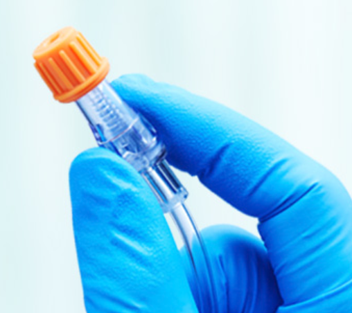 Lab Technician Using Device