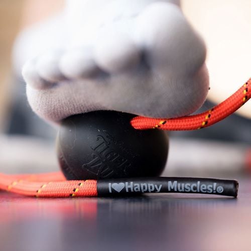 Using the massage ball on the foot