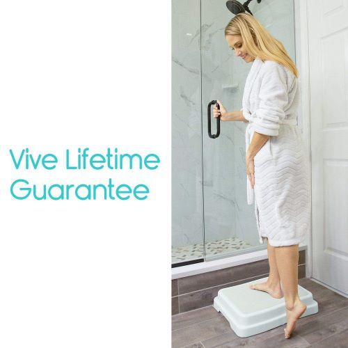 Using bath step to get into the shower.