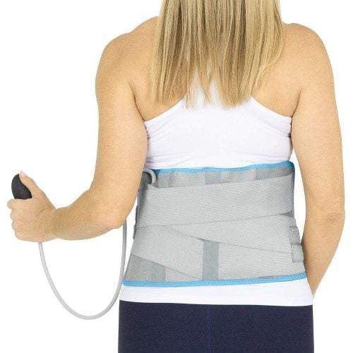 A user adjusts the compression of the back wrap
