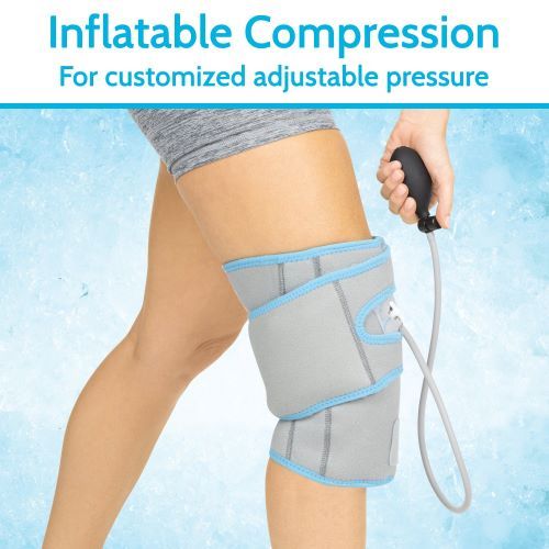 A user adjusts the compression with the hand inflation bulb while wearing the knee wrap