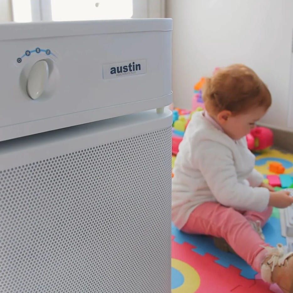 Toddler Playing in Room With Air Purifier