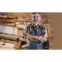 This lifestyle photo is of a man who is a carpenter in his woodshop and he is wearing his G5 carry bag over his apron. 