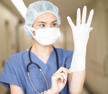 Woman with Gloves and Mask