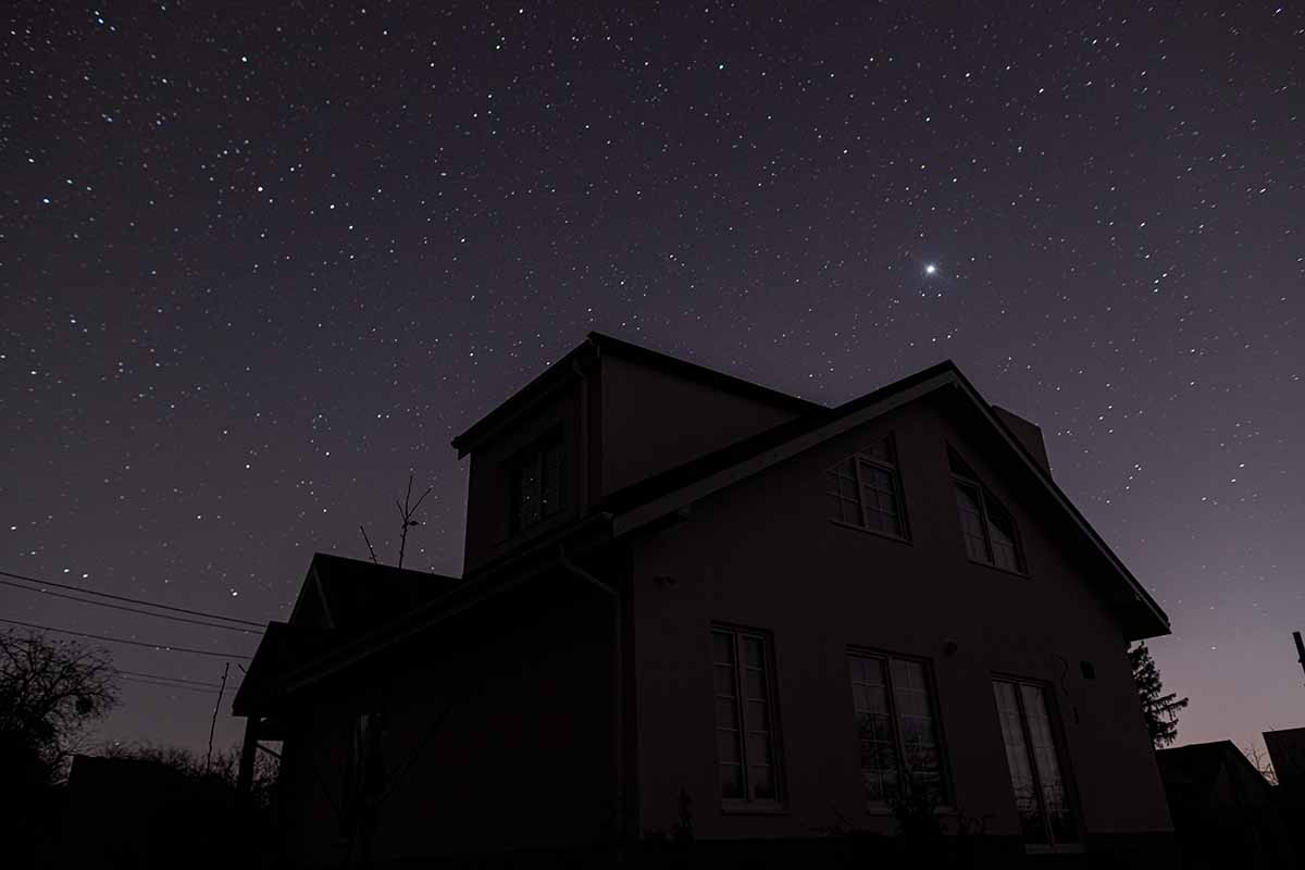 Street view of a house with no lights on